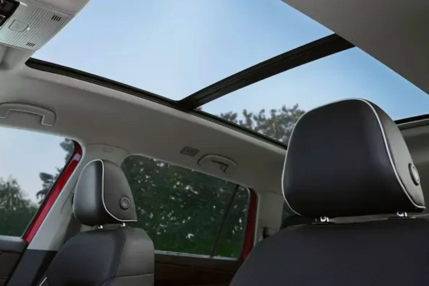 Volkswagen SUV interior with panoramic sunroof and black seats